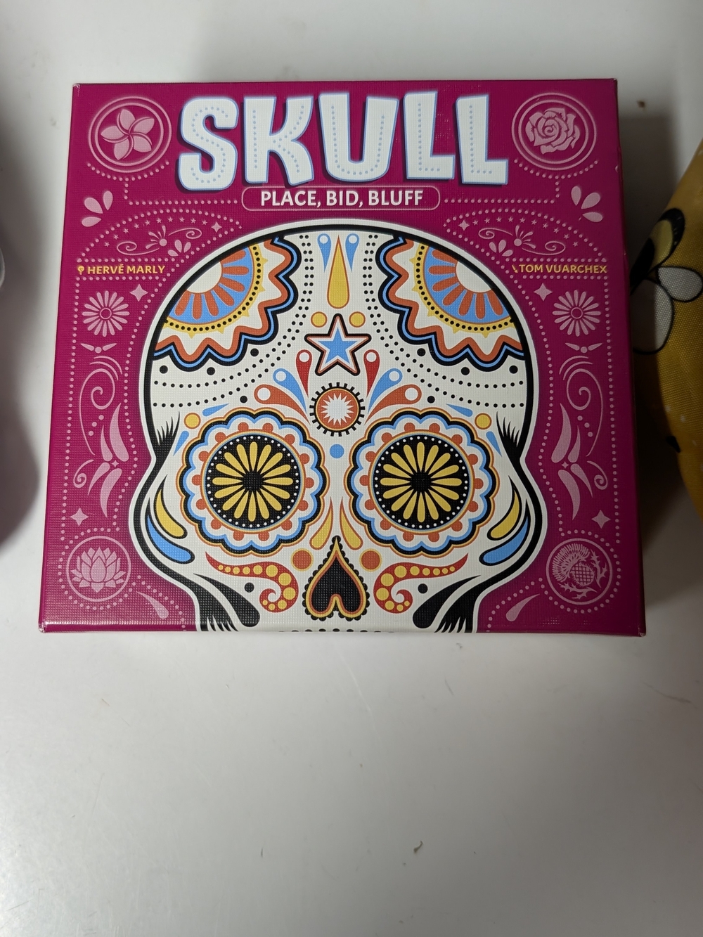 Place, Bid, Bluff Party Game - Pink Sugar Skull Box